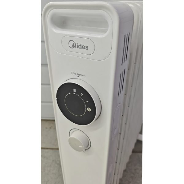 Масляный обогреватель Midea мощностью 3000 Вт