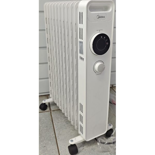 Масляный обогреватель Midea мощностью 3000 Вт